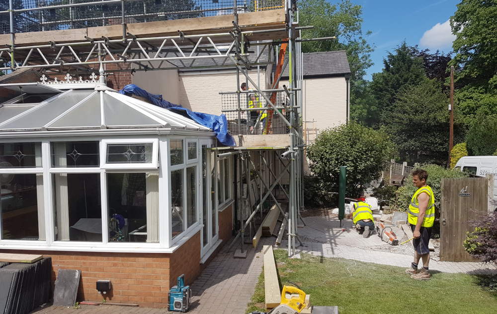 The Roof Expert team constructing a new roof.